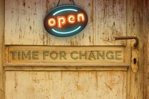 Image of door with the open sign and the saying "Time for Change""